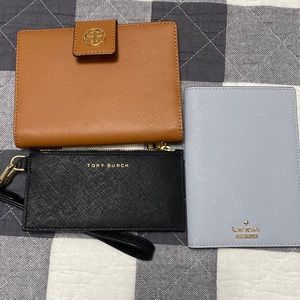 3 good wallets 2 Tory Burch and one Kate spade well kept